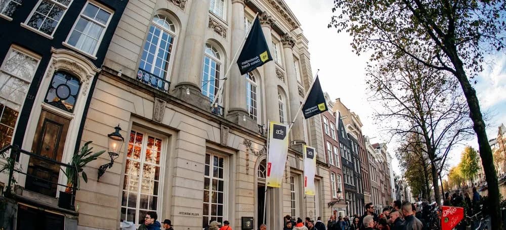 Archive ADE photograph of the exterior of Felix Meritis; source filename credits Kapaphotography. Not a photograph of the 2026 panel.